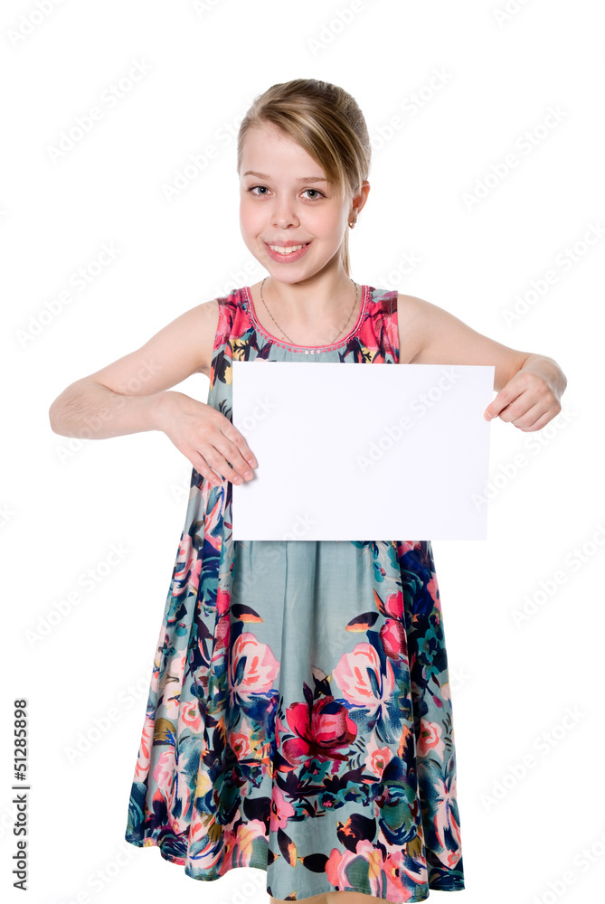 Smiling girl standing with empty blank paper in hands Smiling girl standing with empty blank paper in hands