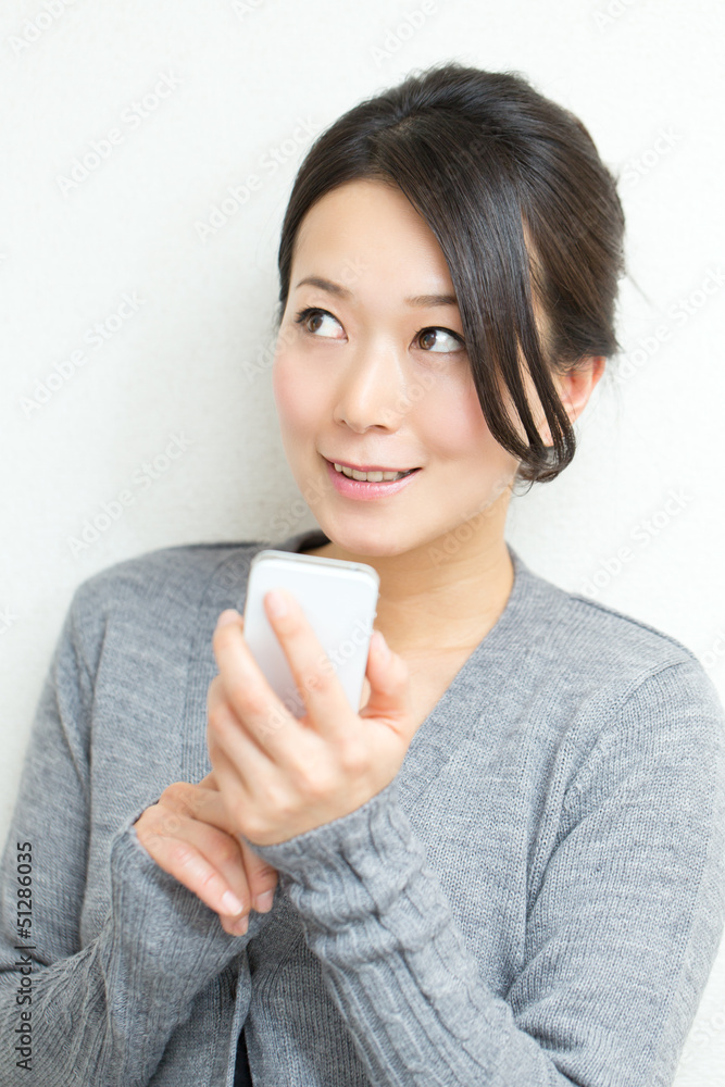 Beautiful asian woman relaxing on white background Beautiful asian woman relaxing on white background