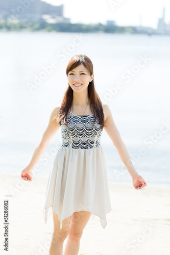 Beautiful asian woman on beach summer holiday