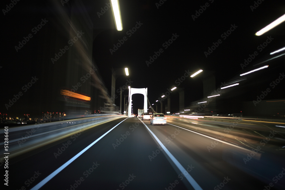 Obraz premium Driving on the night road
