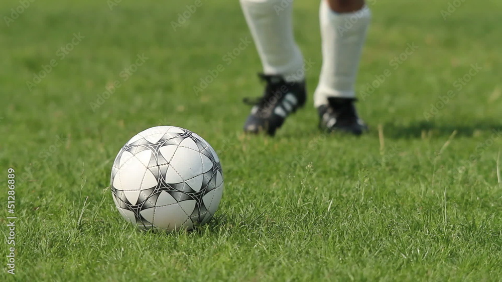 Close up of soccer ball being kicked Close up of soccer ball being kicked