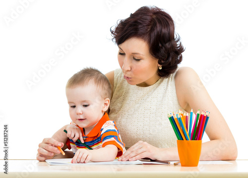 baby boy and mother drawing...