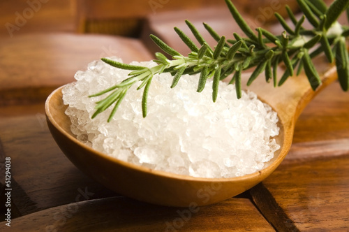 sea salt with rosemary on a wooden spoon