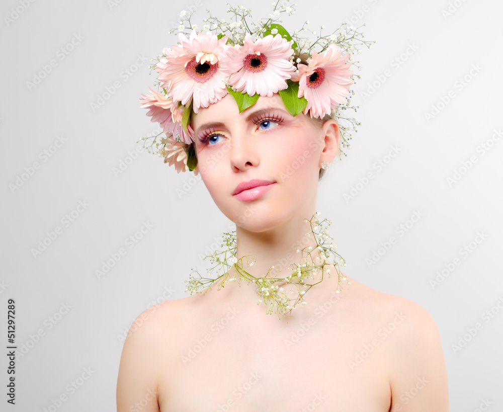 beautiful girl wearing wreath of flowers