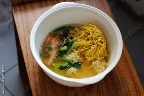 Chinese egg noodle soup with pork
