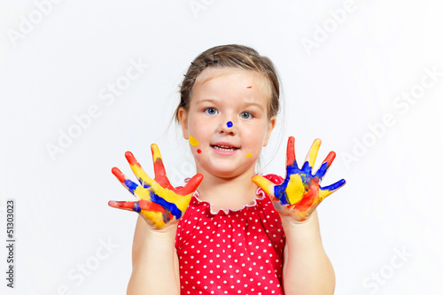 happy child with paint on the hands