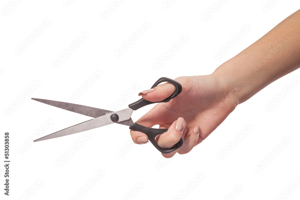 Hand is holding scissors isolated Hand is holding scissors isolated