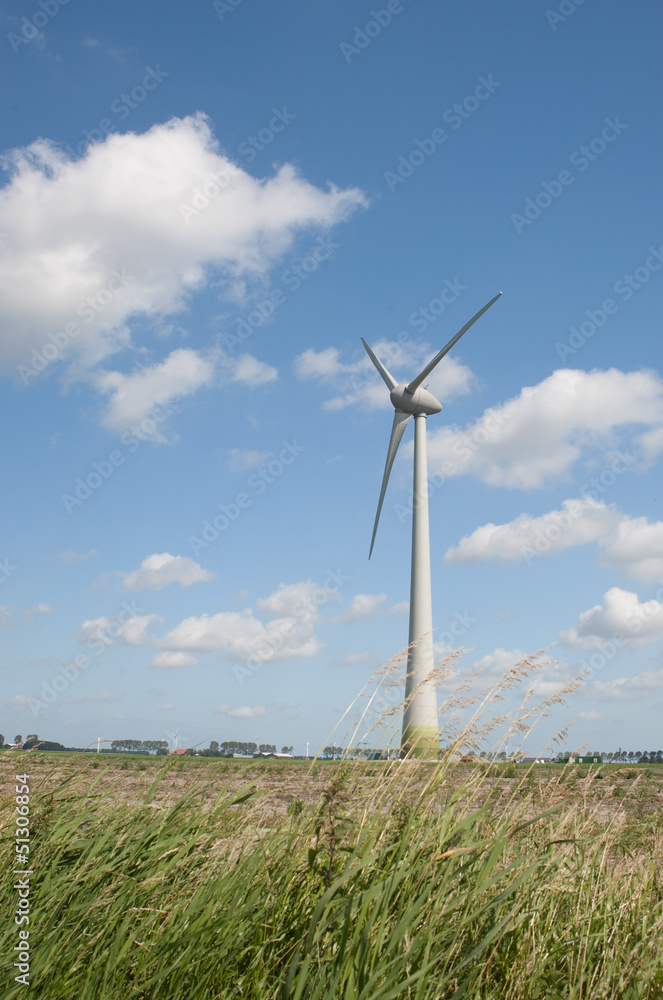 Windturbine producing alternative green energy Windturbine producing alternative green energy