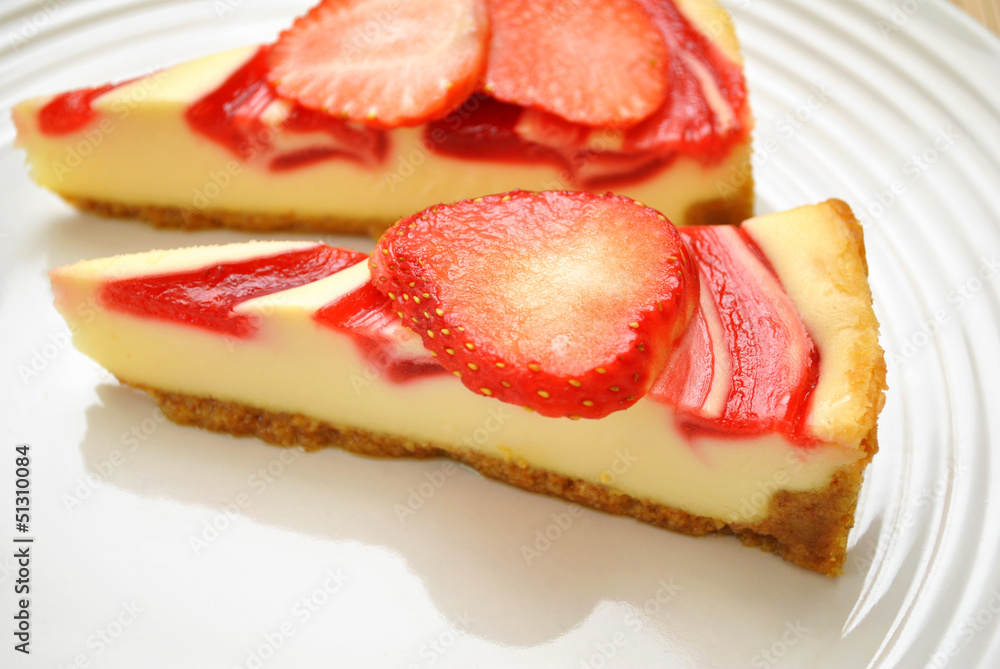 Delicious Strawberry Cheesecake on a White Plate