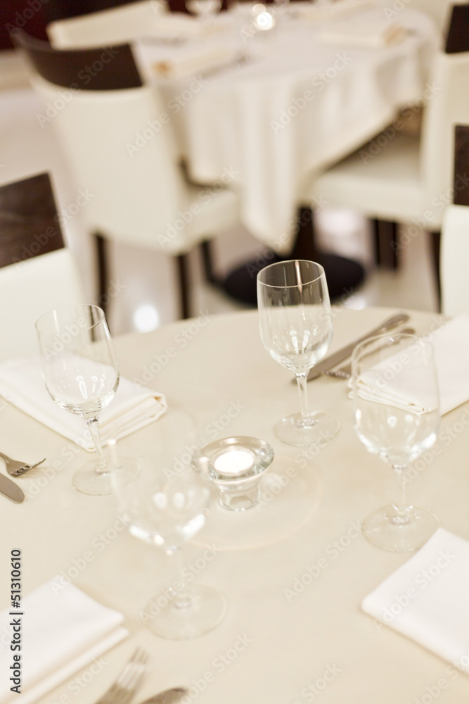 Tables set for meal Tables set for meal