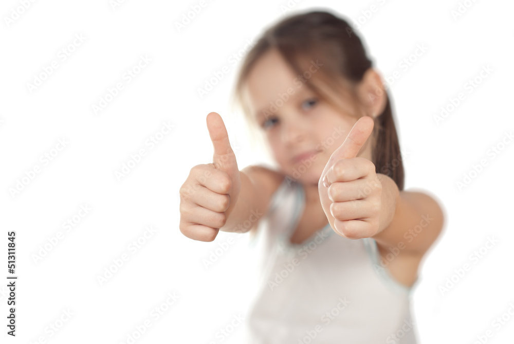 Portrait of a girl showing thumbs up isolated