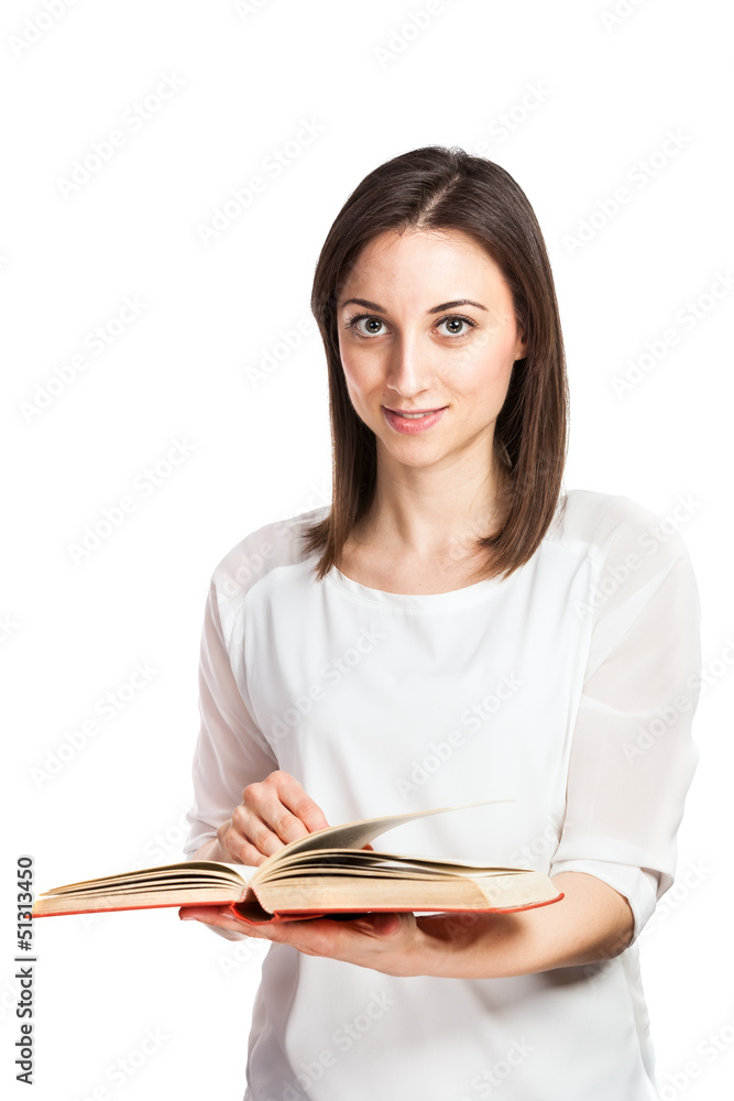 Beautiful young woman browsing through the pages of the red book Beautiful young woman browsing through the pages of the red book