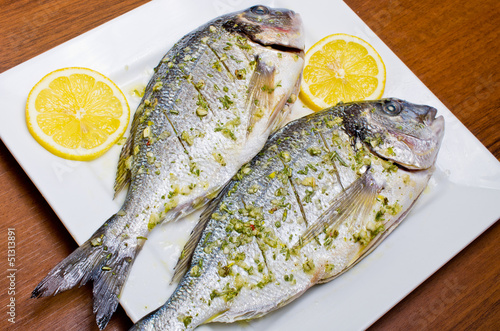 Marinated gilthead fishes