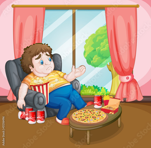 A fat boy with lots of foods