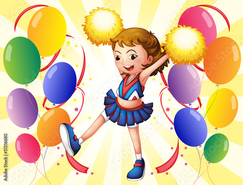 A cheerleader dancing in the middle of the balloons