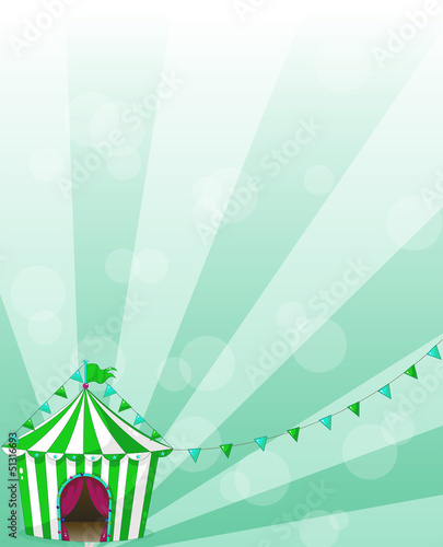 A green circus tent in a wallpaper design
