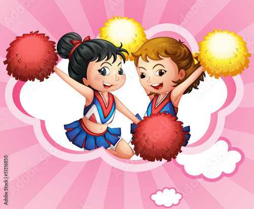 Two young and energetic cheerdancers