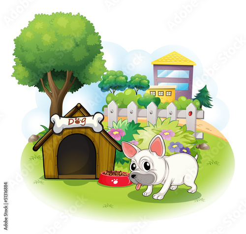 A dog and his doghouse inside the fence