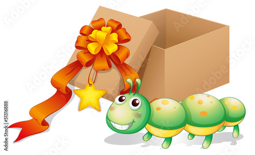 A caterpillar toy beside a box