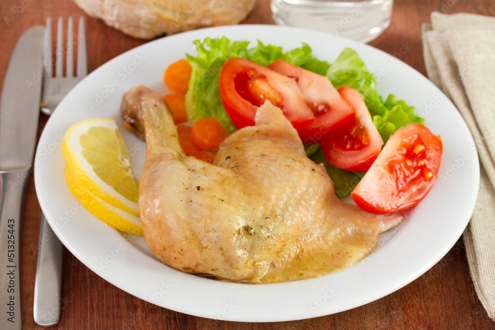 chicken with carrot and salad on plate chicken with carrot and salad on plate