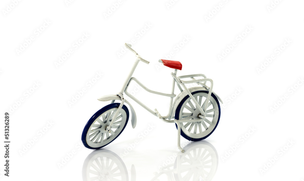 small white toy bike