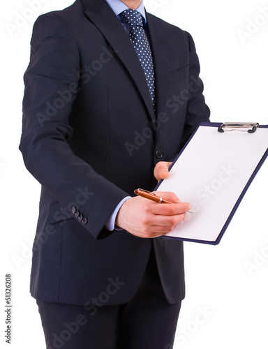 Businessman with pen and clipboard.
