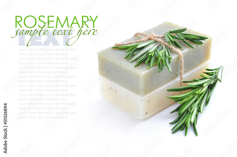 Rosemary Handmade Soap with the sprigs of rosemary on a white ba Rosemary Handmade Soap with the sprigs of rosemary on a white ba