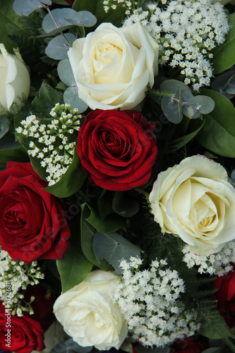 Red and white roses in a bridal bouquet