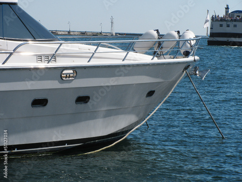 bowsprit of luxury speed boat in seaport
