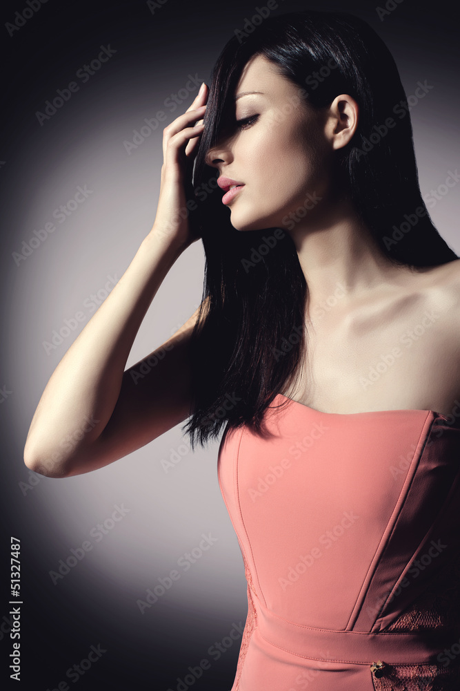 beautiful brunette woman with elegant hairstyle wearing nice cor beautiful brunette woman with elegant hairstyle wearing nice cor