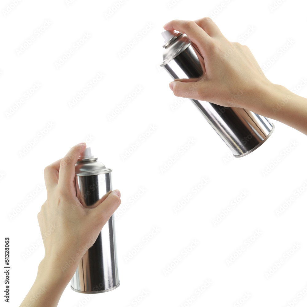 Human hand holding a graffiti Spray can in front of wall Stock Photo ...