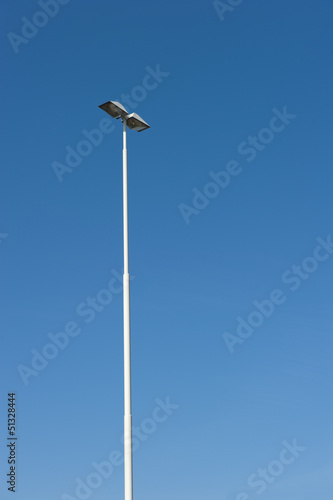 Lamppost at parking of gasstation on highway