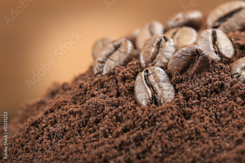 coffee beans on coffee grounds