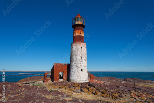 Old lighthouse on Penguin island, Puerto Deseado, Argent