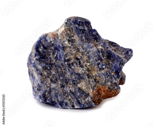 Sodalite blue mineral rock stone on white