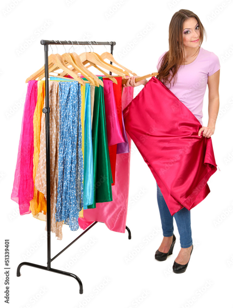 Young girl chooses fabric for future dress isolated on white Young girl chooses fabric for future dress isolated on white