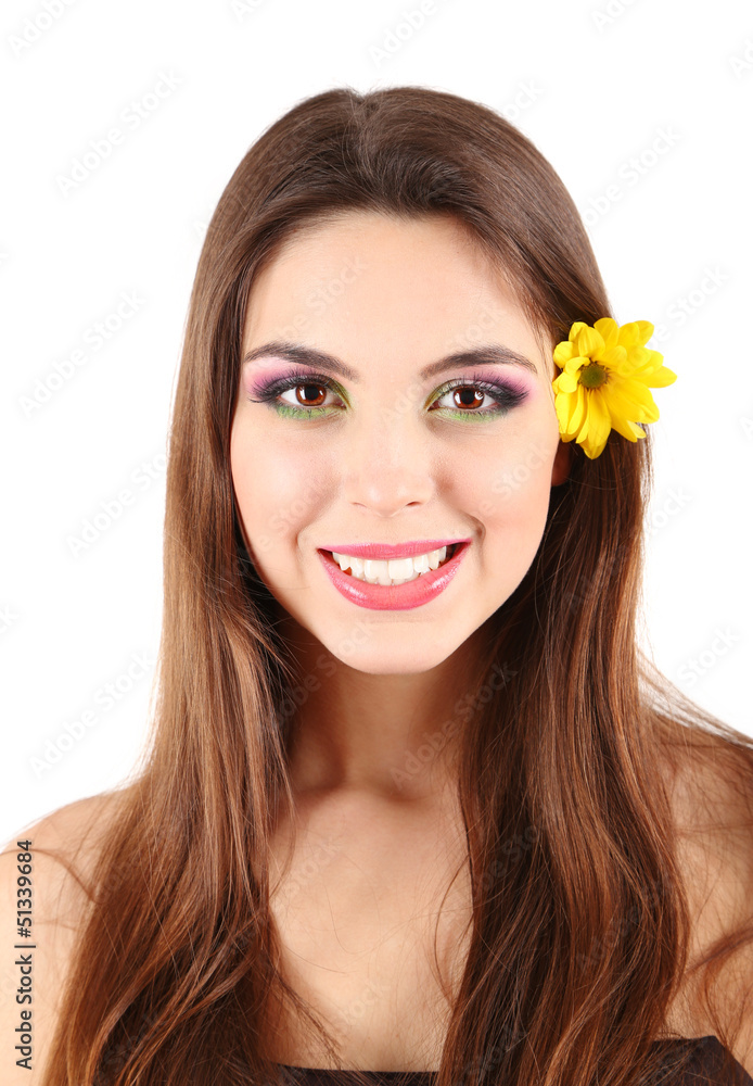 Young beautiful girl with flower in her hair, isolated on white