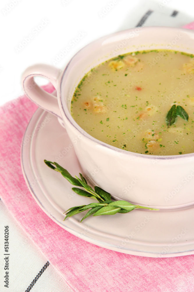 Nourishing soup with vegetables in pan isolated on white Nourishing soup with vegetables in pan isolated on white