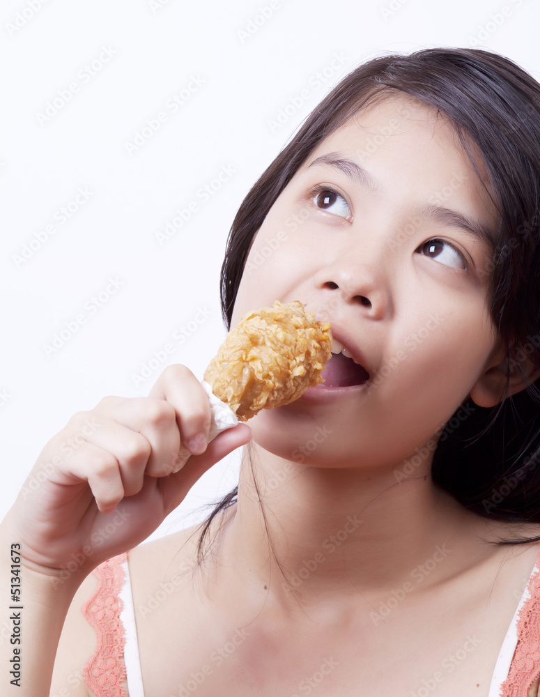 Asian girls eating fried chicken. Asian girls eating fried chicken.