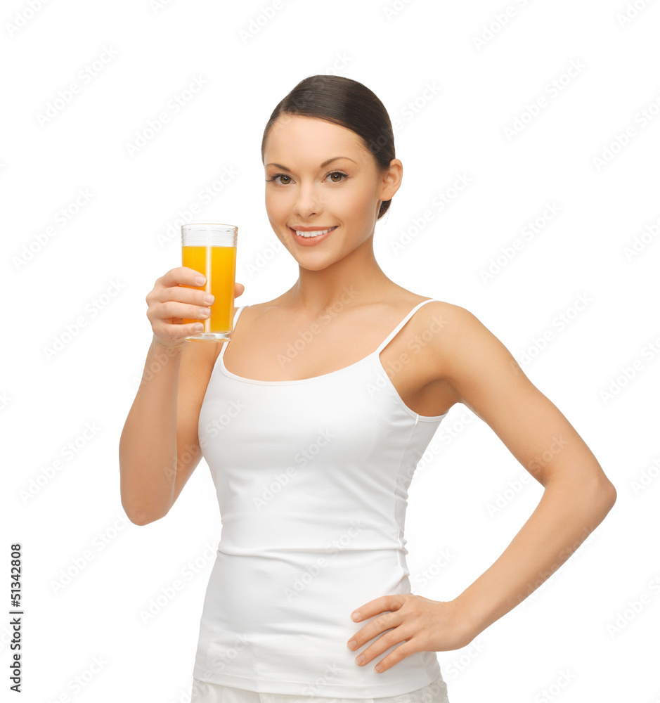 woman holding glass of orange juice woman holding glass of orange juice