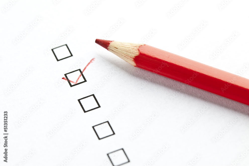 Red pencil selecting a empty check box Red pencil selecting a empty check box