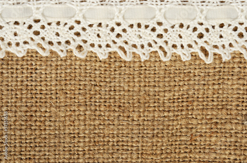 Canvas background with lace on the edge