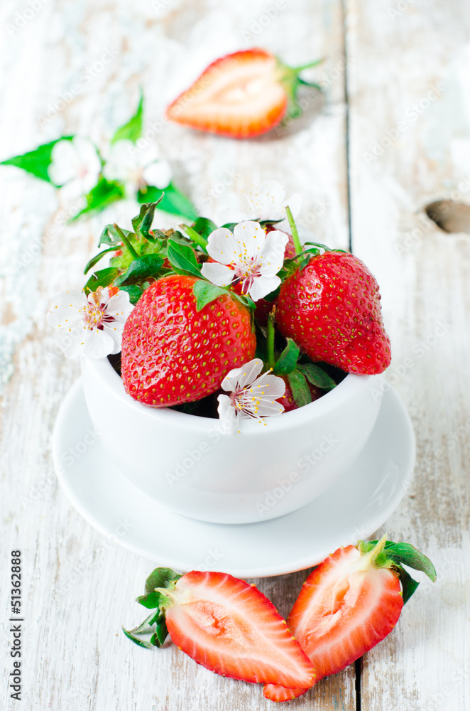 Fresh strawberries in the white bowl Fresh strawberries in the white bowl