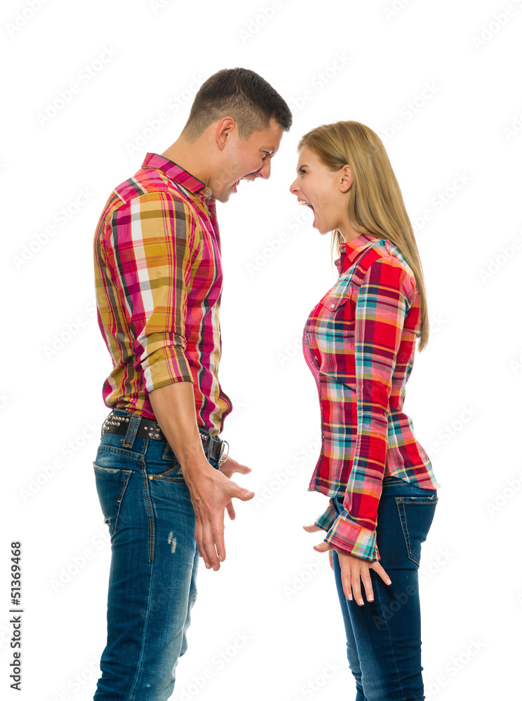 Portrait of an angry couple shouting Portrait of an angry couple shouting
