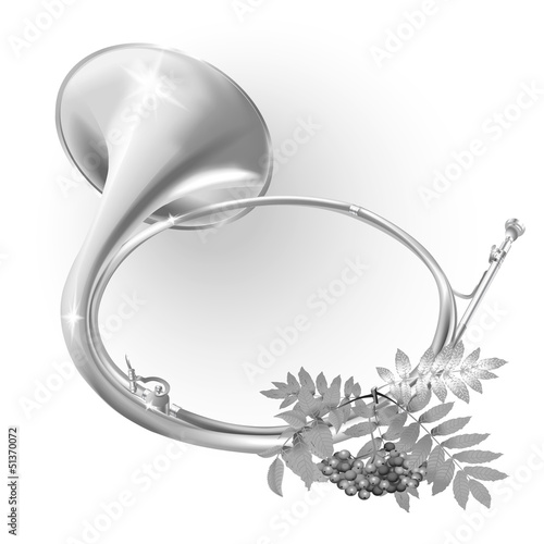 Traditional hunting horn on white background with rowan