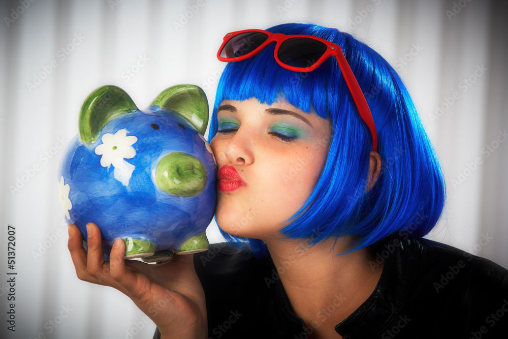 Naklejka premium teenager girl with piggy bank