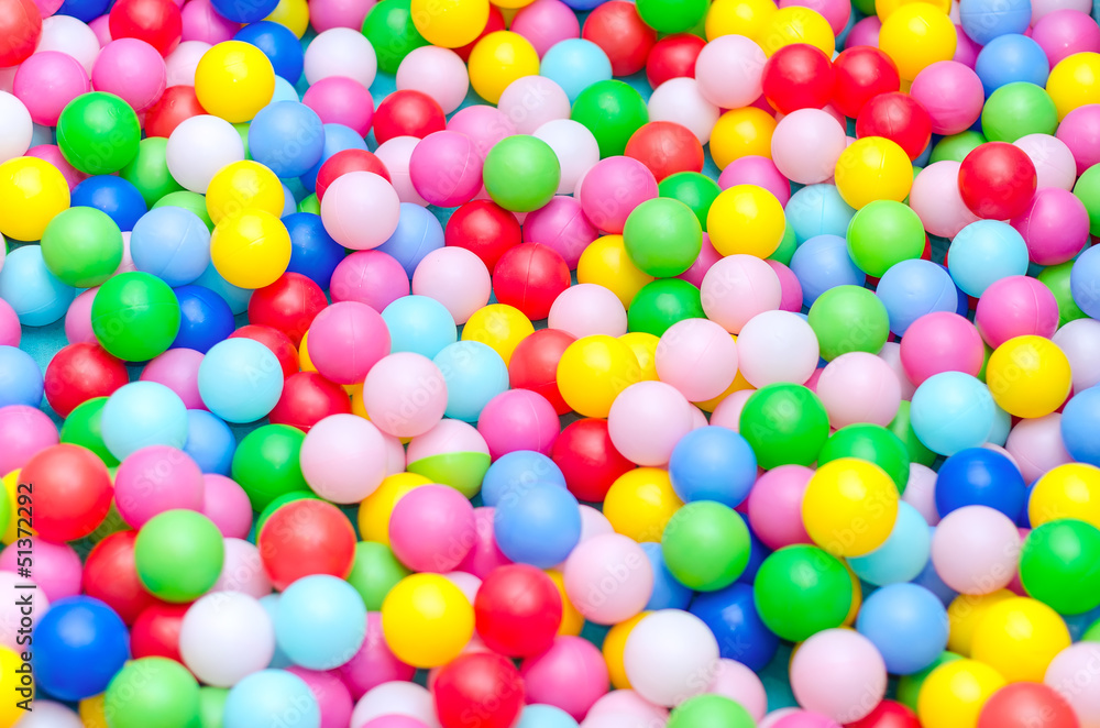 A lot of coloured plastic balls in playroom A lot of coloured plastic balls in playroom