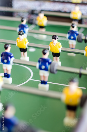 Table football game with yellow and blue players © M-Production