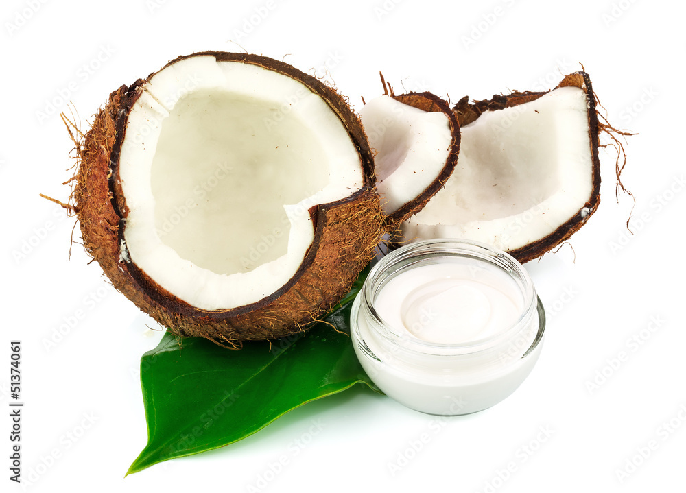 Coconut cocos with cream and green leaf Coconut cocos with cream and green leaf