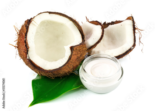 Coconut cocos with cream and green leaf